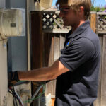 Dollens Electric logo